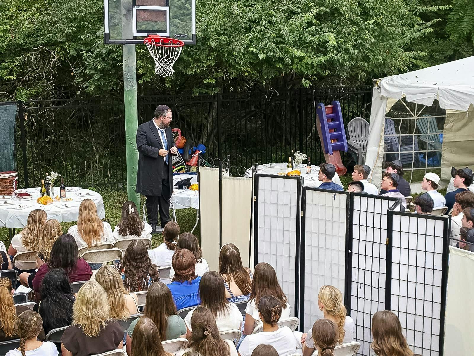 Rabbi Yossi leads service for Rosh Hashanah at Chabad.