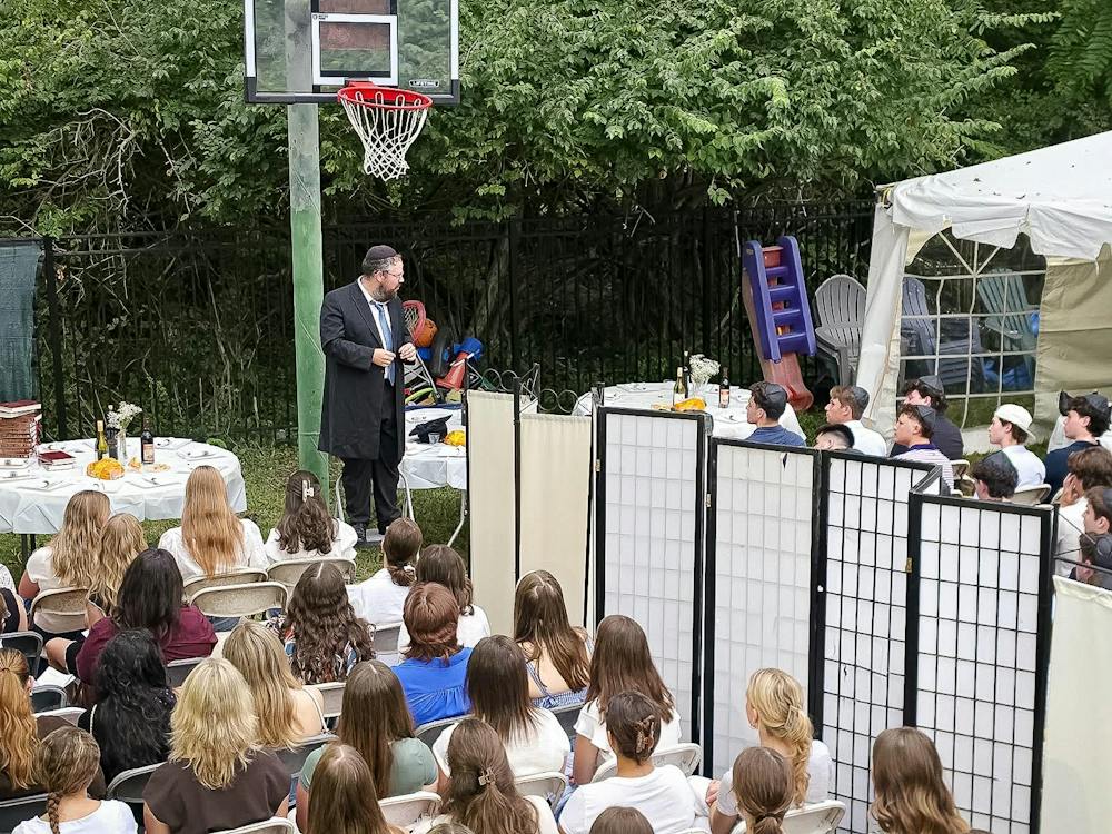 Rabbi Yossi leads service for Rosh Hashanah at Chabad.