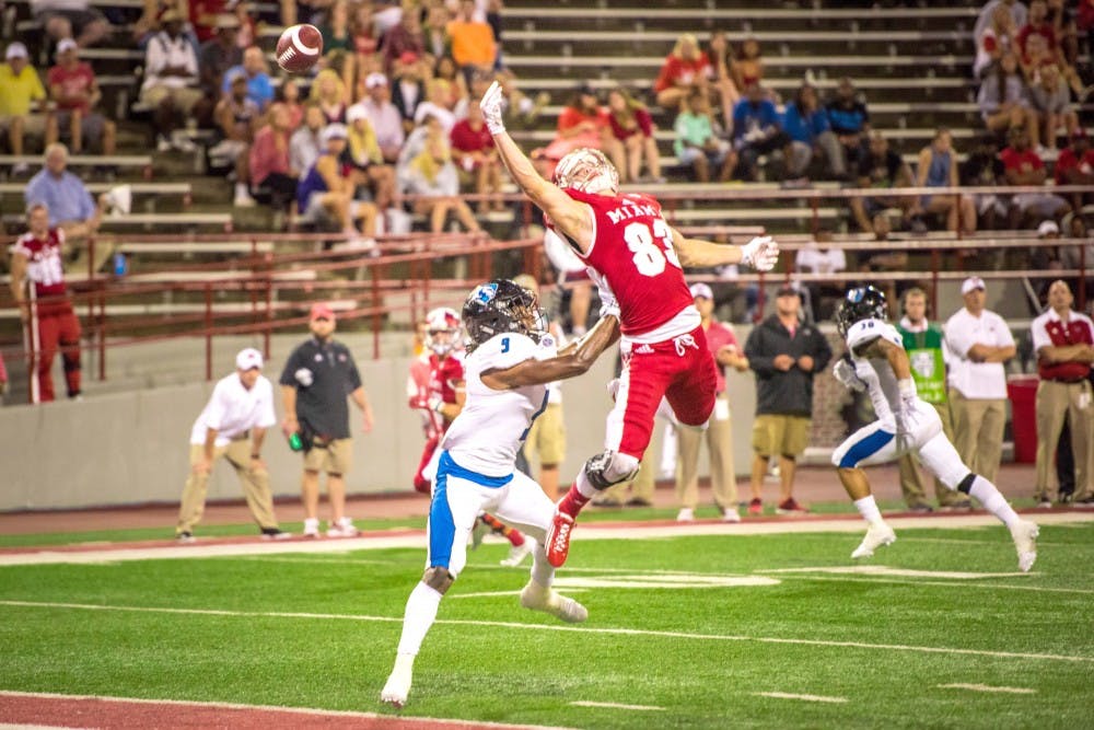 Senior wide receiver Sam Martin just misses a pass against E. Illinois. Martin finished with two receptions totaling 27 yards.