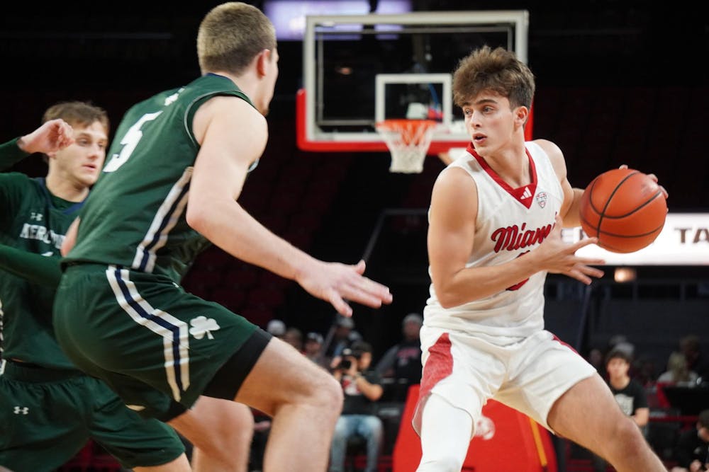 <p>Sophomore guard Luke Skaljac holds the ball against Mercyhurst at Millett Hall on Nov. 20</p>