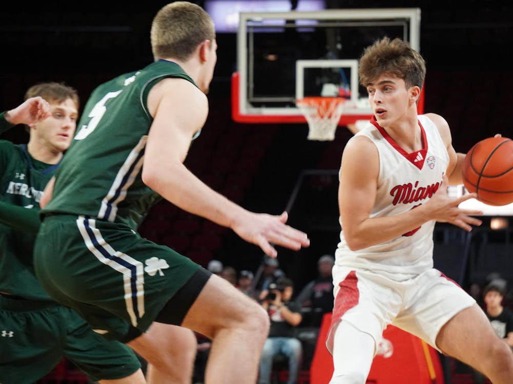 Sophomore guard Luke Skaljac holds the ball against Mercyhurst at Millett Hall on Nov. 20