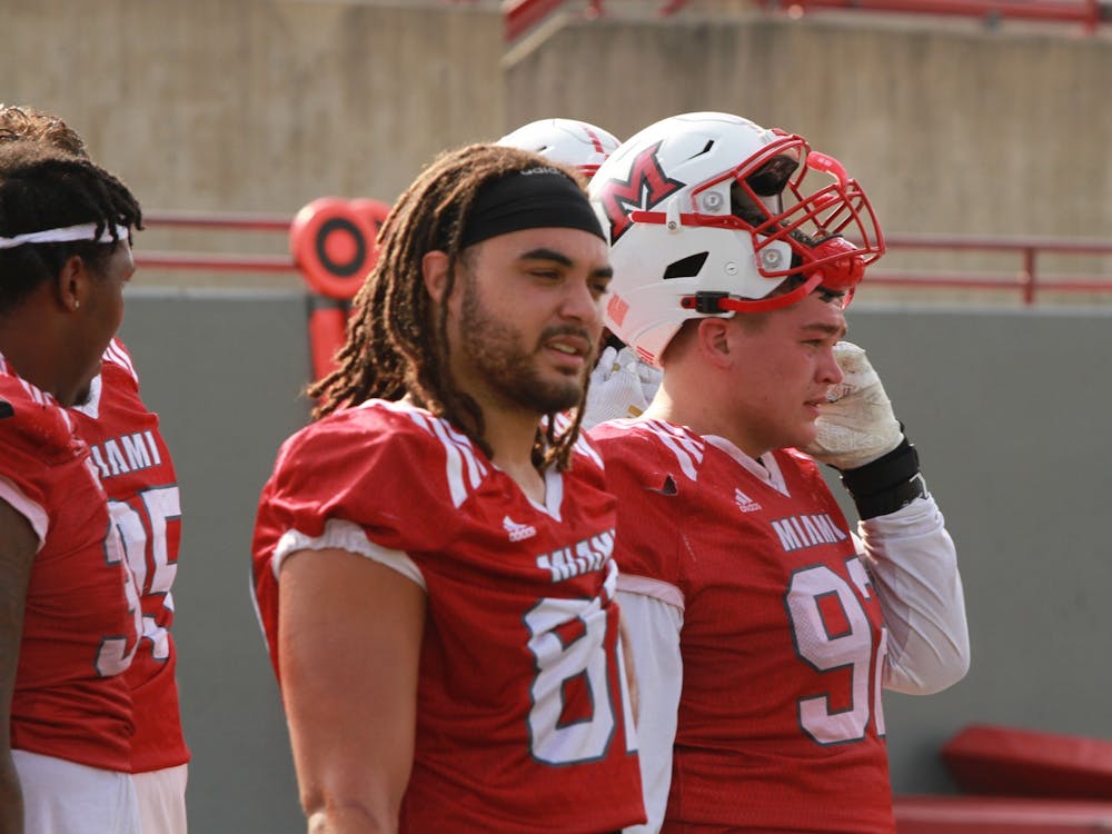 Defensive linemen Kameron Butler (middle) and Ben Kimpler (right) will be important to Miami's success this season.