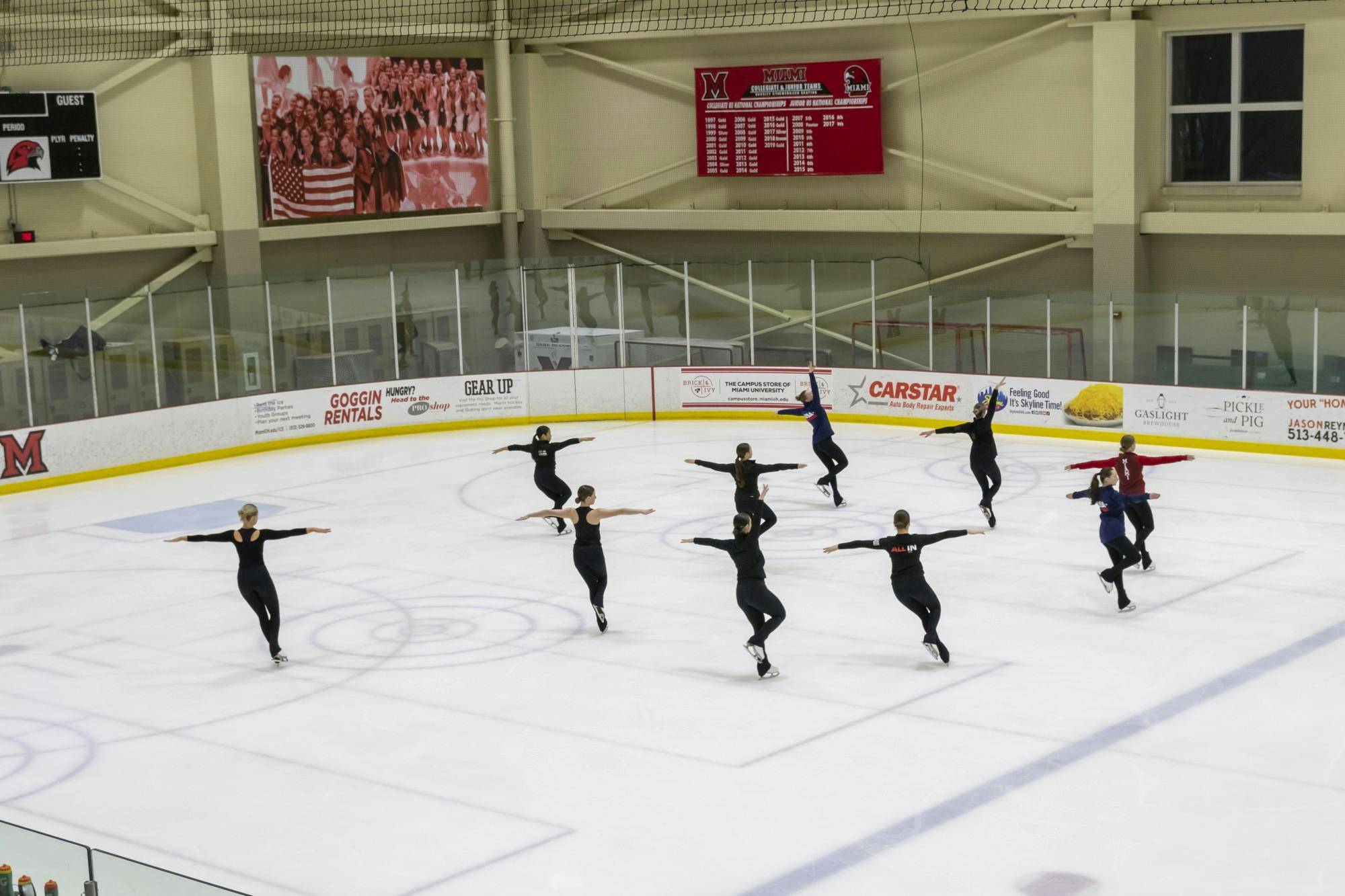 The senior synchronized skating team practices a program at Goggin Center