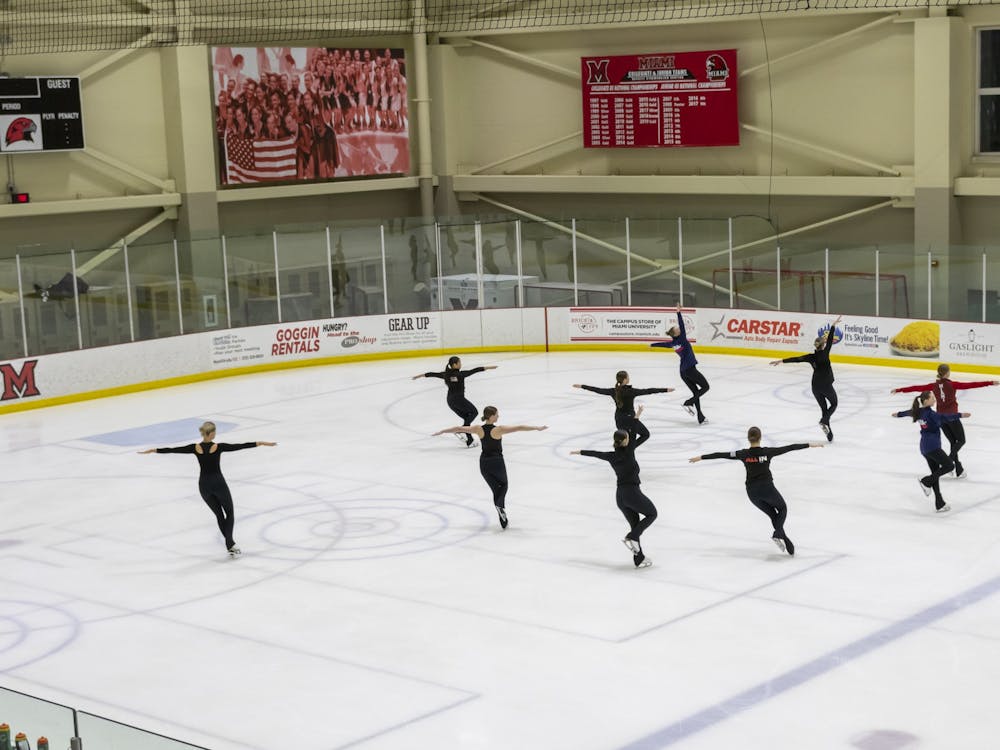 The senior synchronized skating team practices a program at Goggin Center