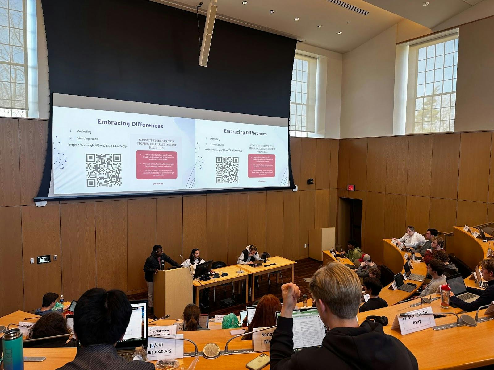 Secretary for Diversity, Equity, and Inclusion August Ogunnowo gives ASG a committee update. DEI week will be April 15-20. 