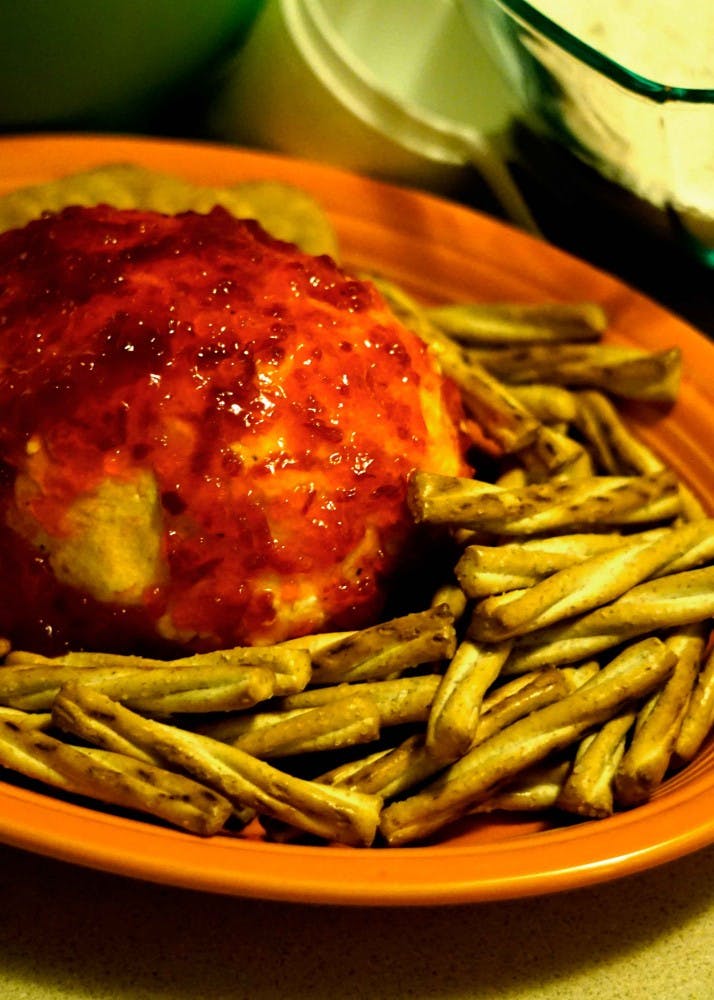 Honey wheat sticks make a perfect vehicle for the innards of a creamy, peppery cheese ball.