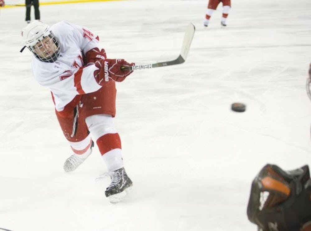 Senior Vincent LoVerde takes a shot during the game against Bowling Green State Univeristy at Goggin Ice Center.