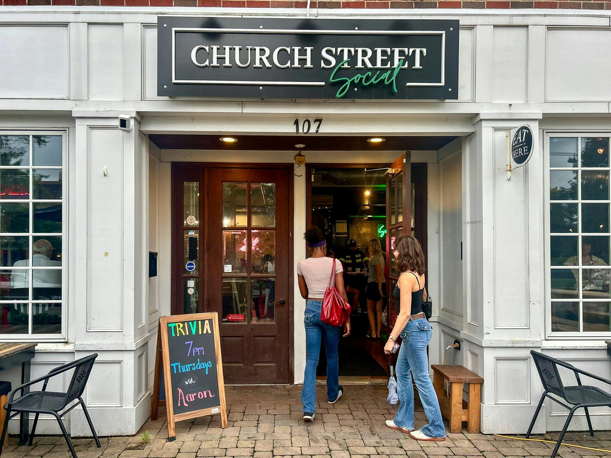 Neah Brown and Alivia Brello enjoy Church Street Social’s last night open on July 31.