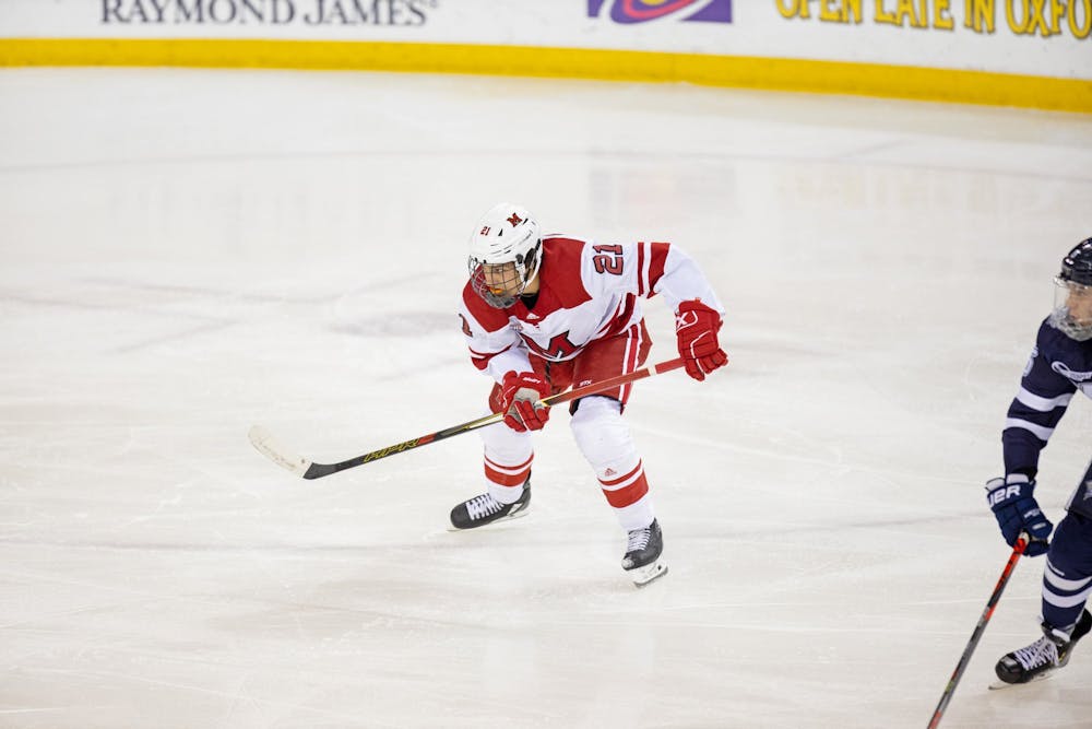 Freshman forward Ryan Larkin skates against New Hampshire on Oct. 12 at the Steve &#x27;Coach&#x27; Cady Arena in the Goggin Ice Center. Miami tied UNH, 4-4, in an overtime contest.