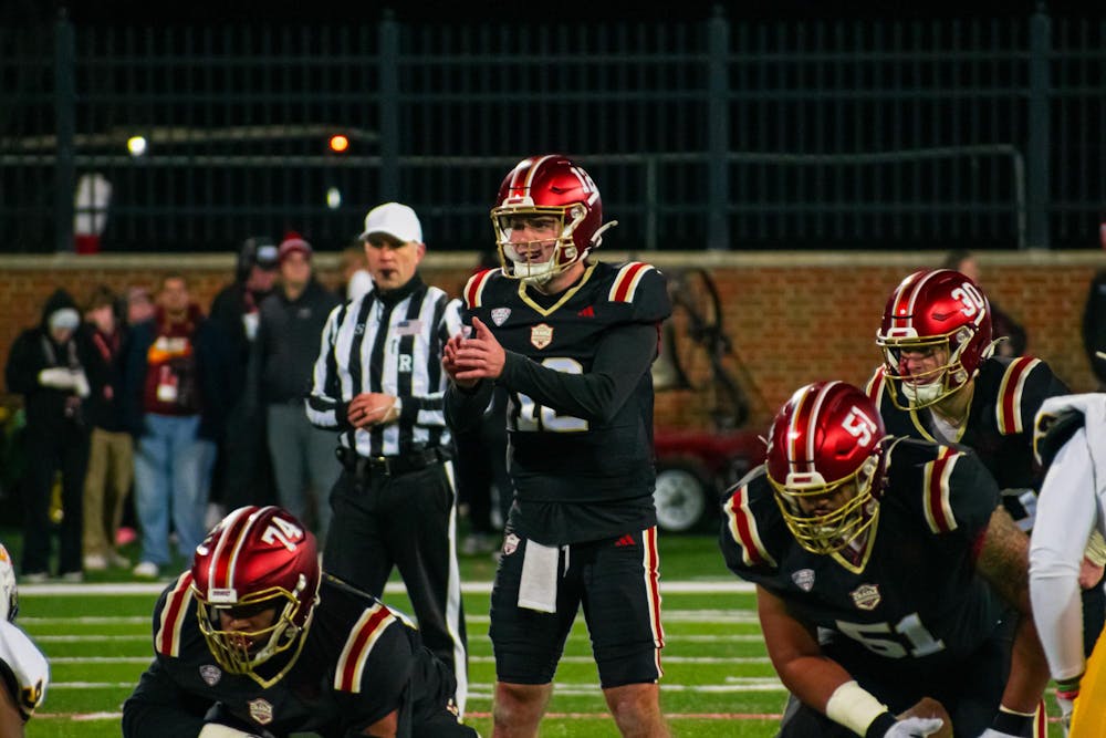 <p>Henry Hesson stands behind center against Toledo at Yager Stadium on Nov. 12</p>