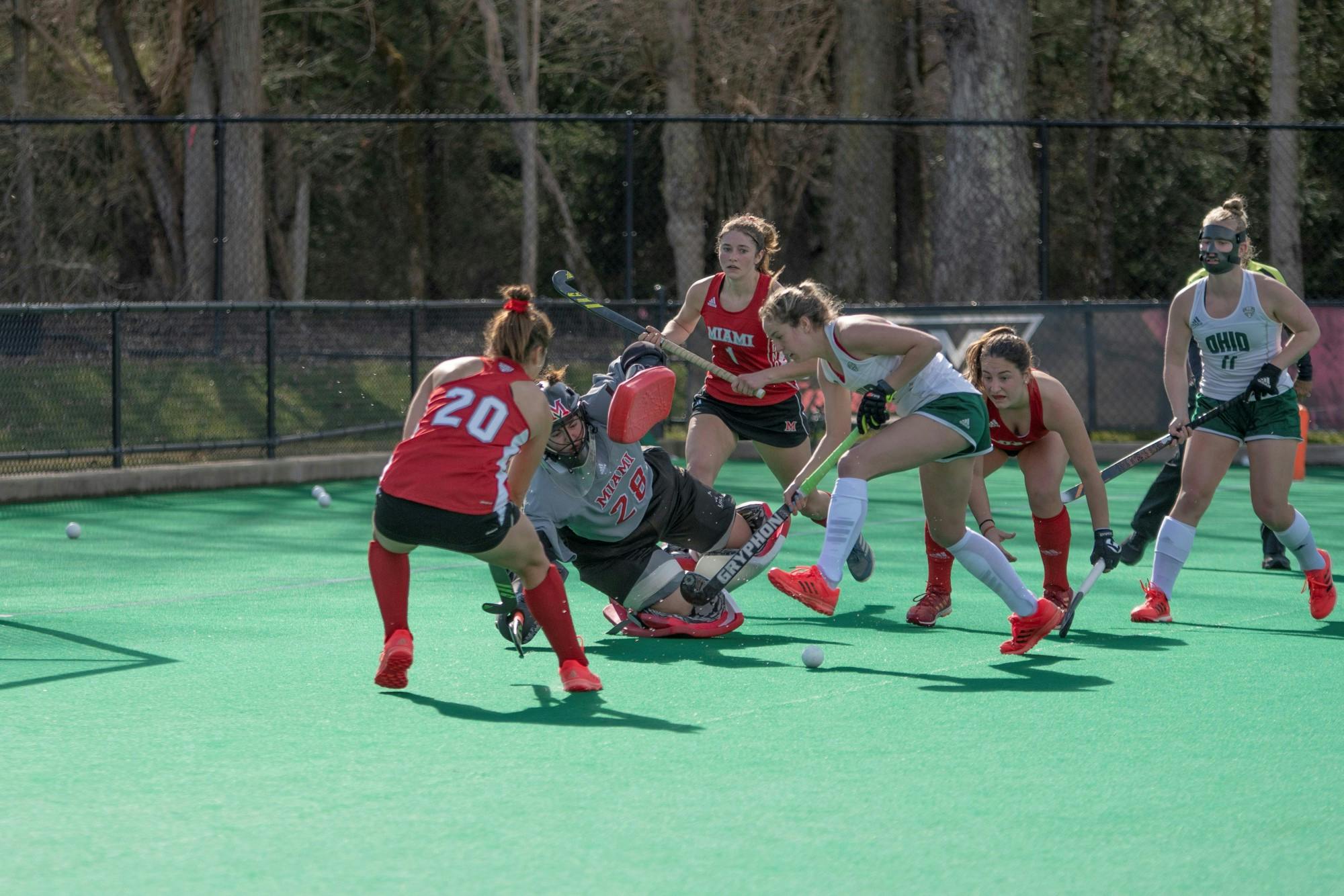 Junior goalkeeper Isabelle Pareese (pictured, No. 28) defends a shot during a Spring 2021 match vs. Ohio University. 