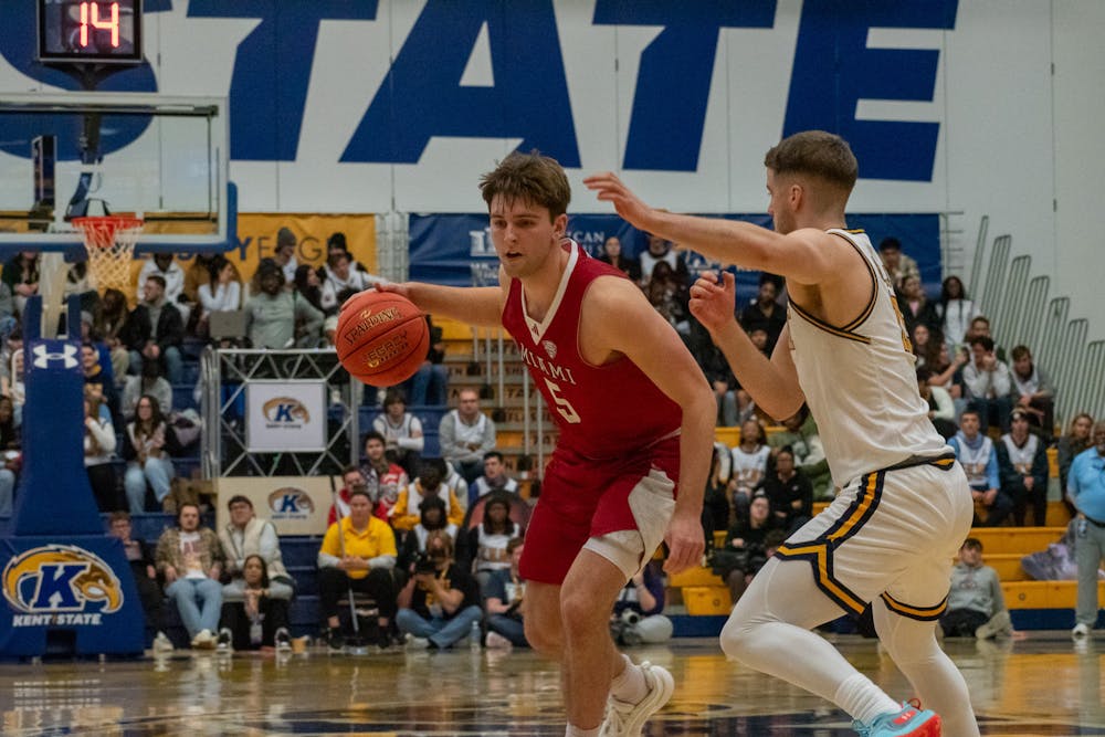 Junior guard Peter Suder dribbling against Kent State on Jan. 18