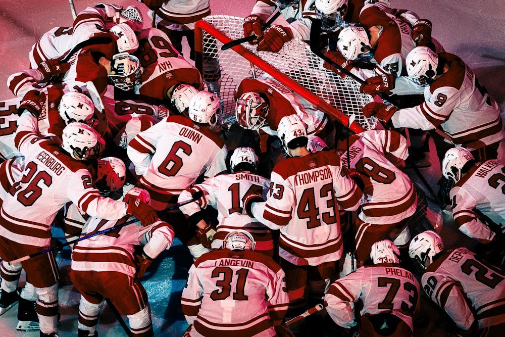 The Miami hockey team gathers at the home net against the University of Minnesota-Duluth at Goggin Ice Center on Feb. 21