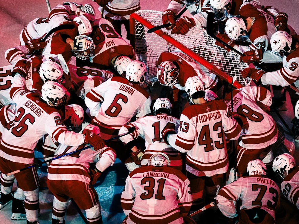 The Miami hockey team gathers at the home net against the University of Minnesota-Duluth at Goggin Ice Center on Feb. 21
