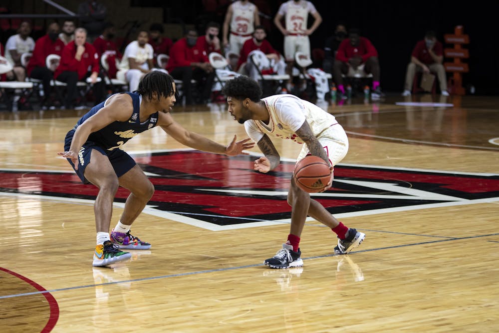 Sophomore guard Dae Dae Grant sizes up a defender during a Feb 12 loss to Akron