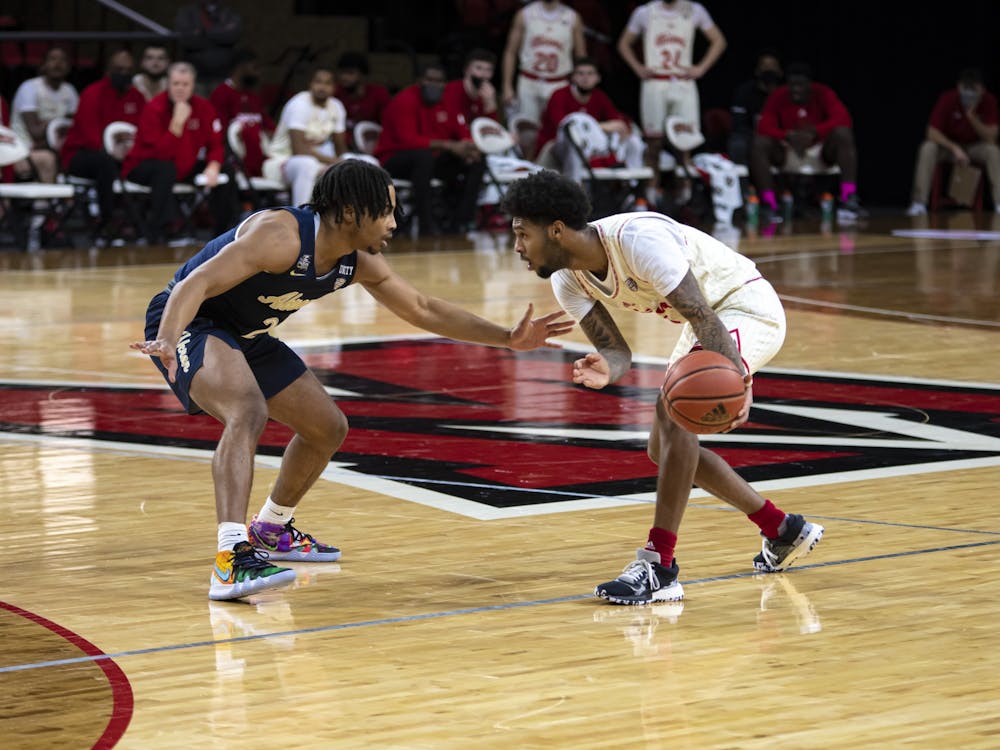Sophomore guard Dae Dae Grant sizes up a defender during a Feb 12 loss to Akron