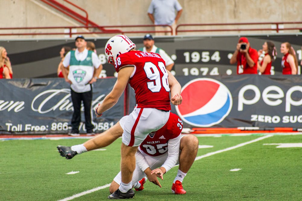 <p>True freshman kicker Graham Nicholson (pictured, No. 98) was awarded the MAC East Special Teams Player of the Week.</p>