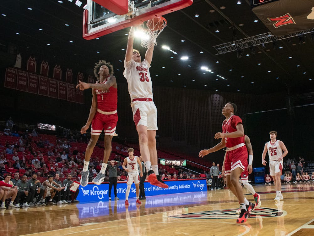 Sophomore center Reece Center going for a dunk against Northern Illinois on Feb. 25