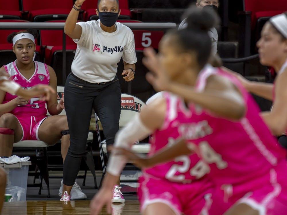 Women's basketball assistant coach Tiffany Swoffard (pictured, in white) has had to adapt her recruiting efforts during the COVID-19 pandemic.