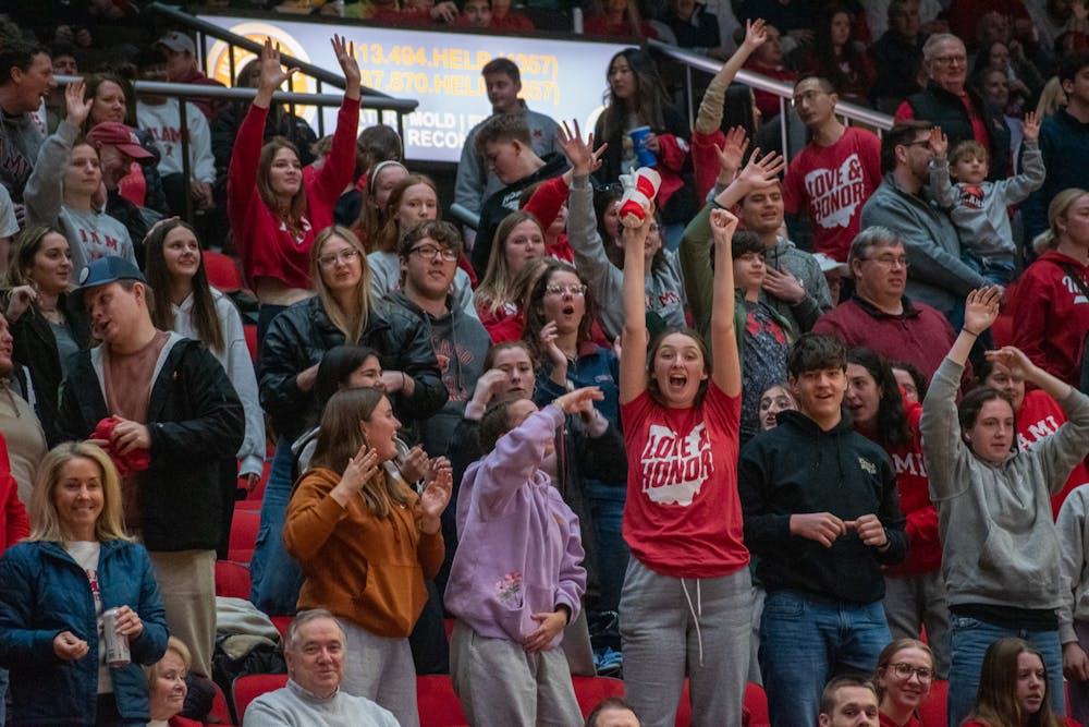 Miami fans celebrating the RedHawks' win over Ball State on March 7