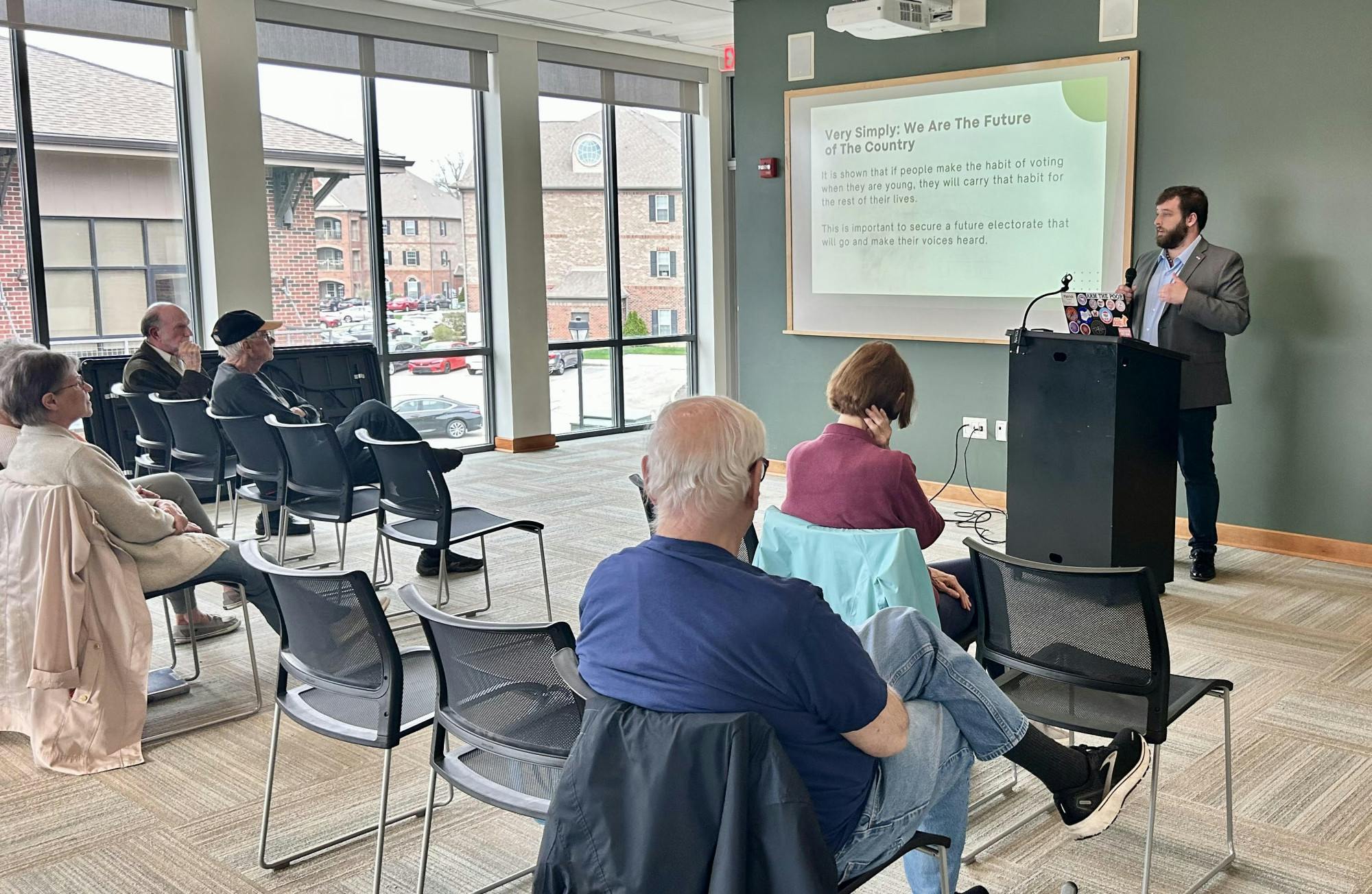 Patrick Houlihan led a community conversation about supporting democracy.