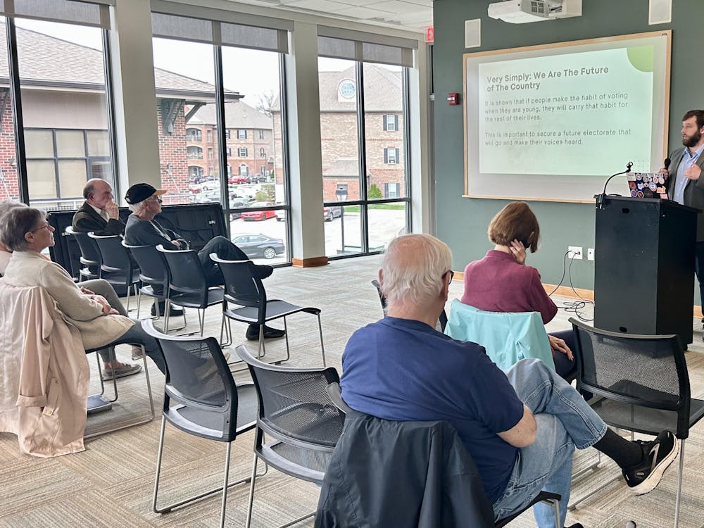 Patrick Houlihan led a community conversation about supporting democracy.