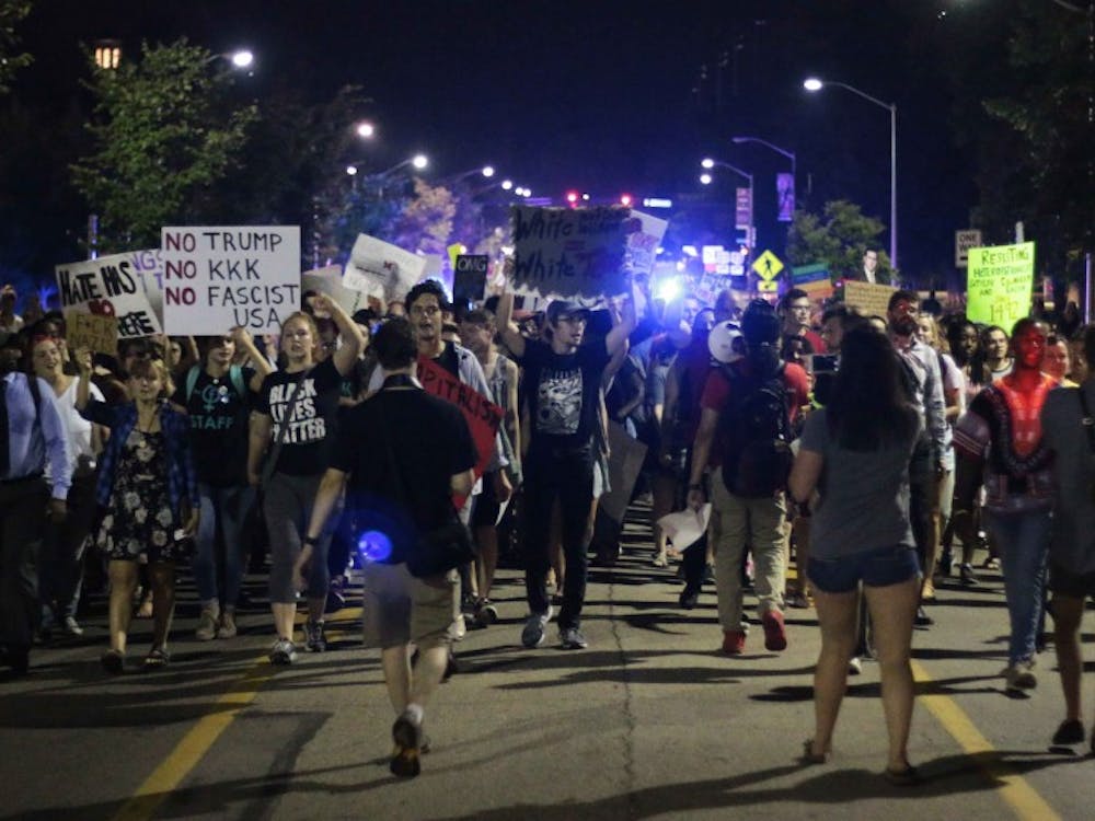The rally swelled as it progressed past Benton Hall, joined by students off the street.
Photo by Ryan Terhune