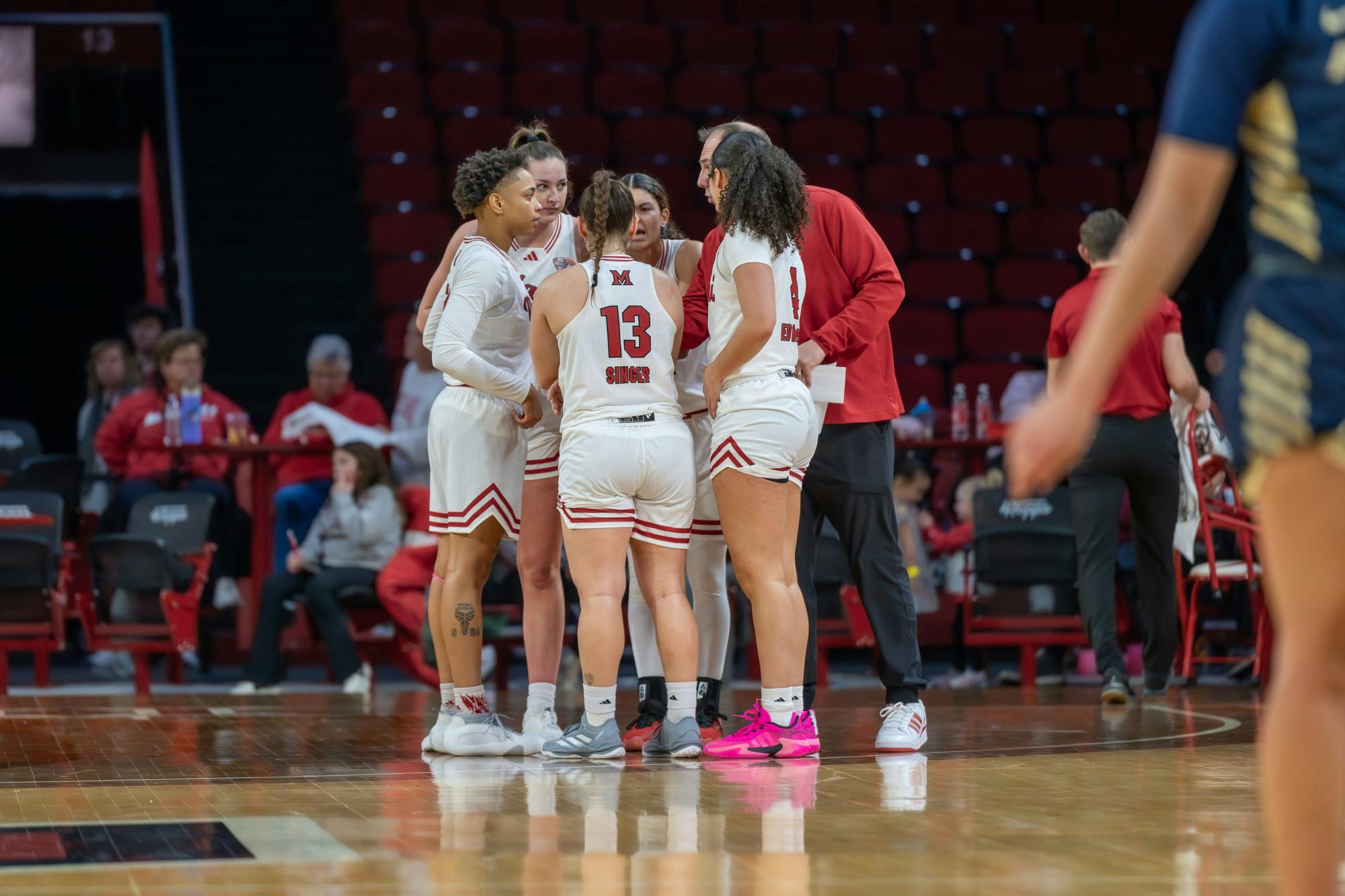 The RedHawks in a huddle at Millett Hall on Jan. 22