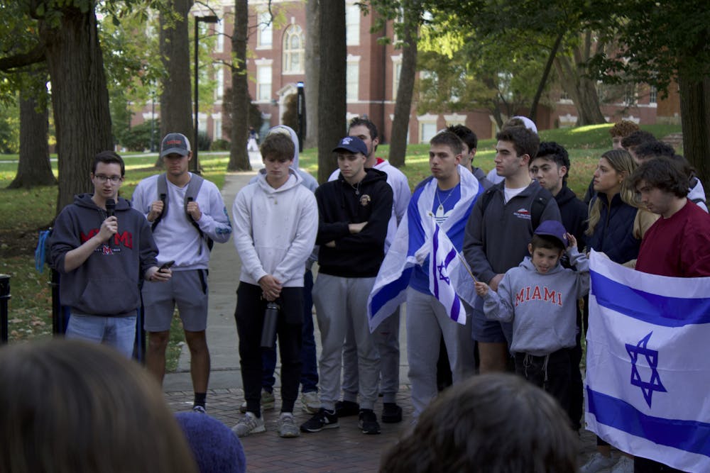 Matthew Lodge, president of Students Supporting Israel, organized the event to facilitate a community at Miami, standing in solidarity for the lives lost during the Israeli-Palestinian conflict.