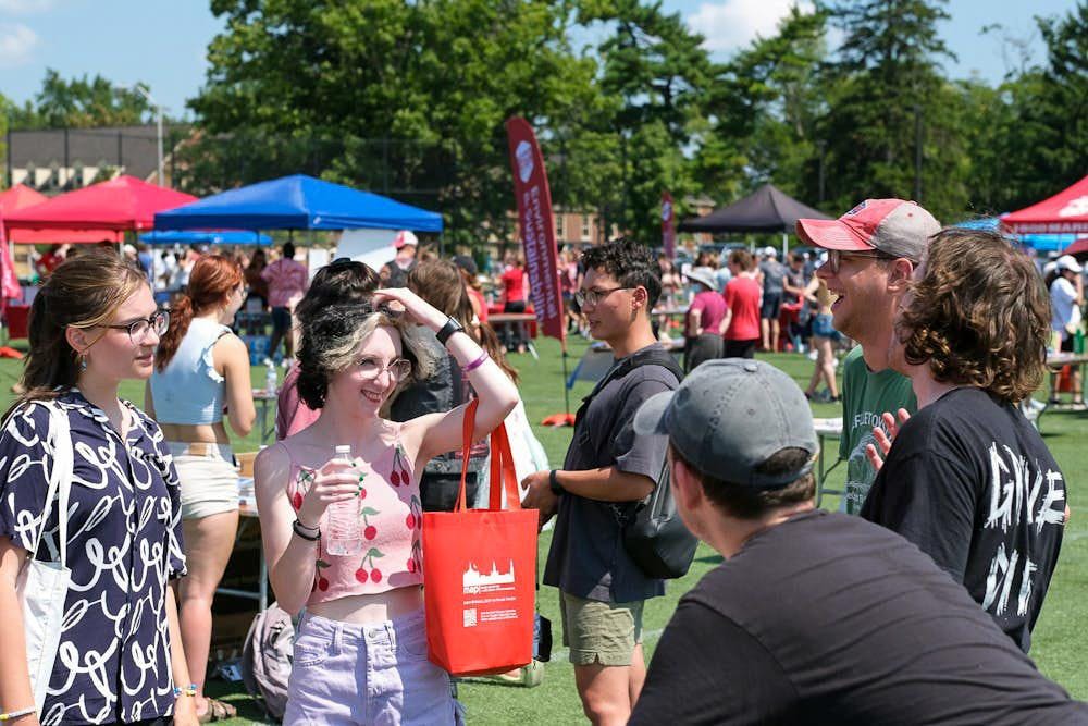 Students exploring last year’s Mega Fair take in the various campus groups which organize events throughout the year at Miami.