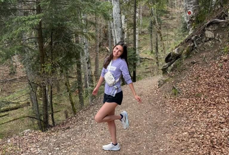 Author Venezia McHenry hikes through Romanian woods during her spring study abroad experience.