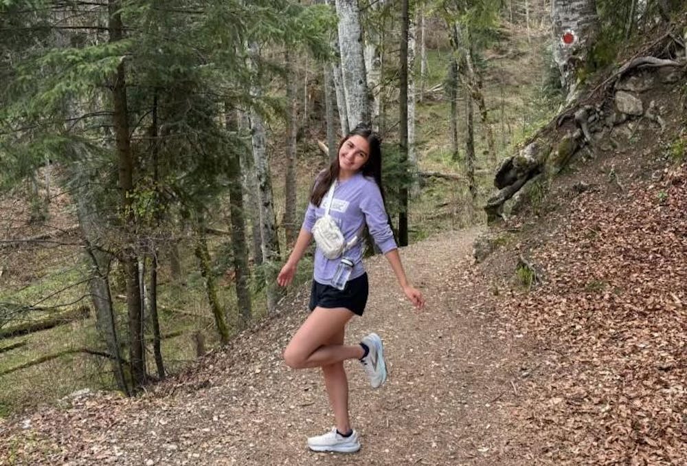 Author Venezia McHenry hikes through Romanian woods during her spring study abroad experience.