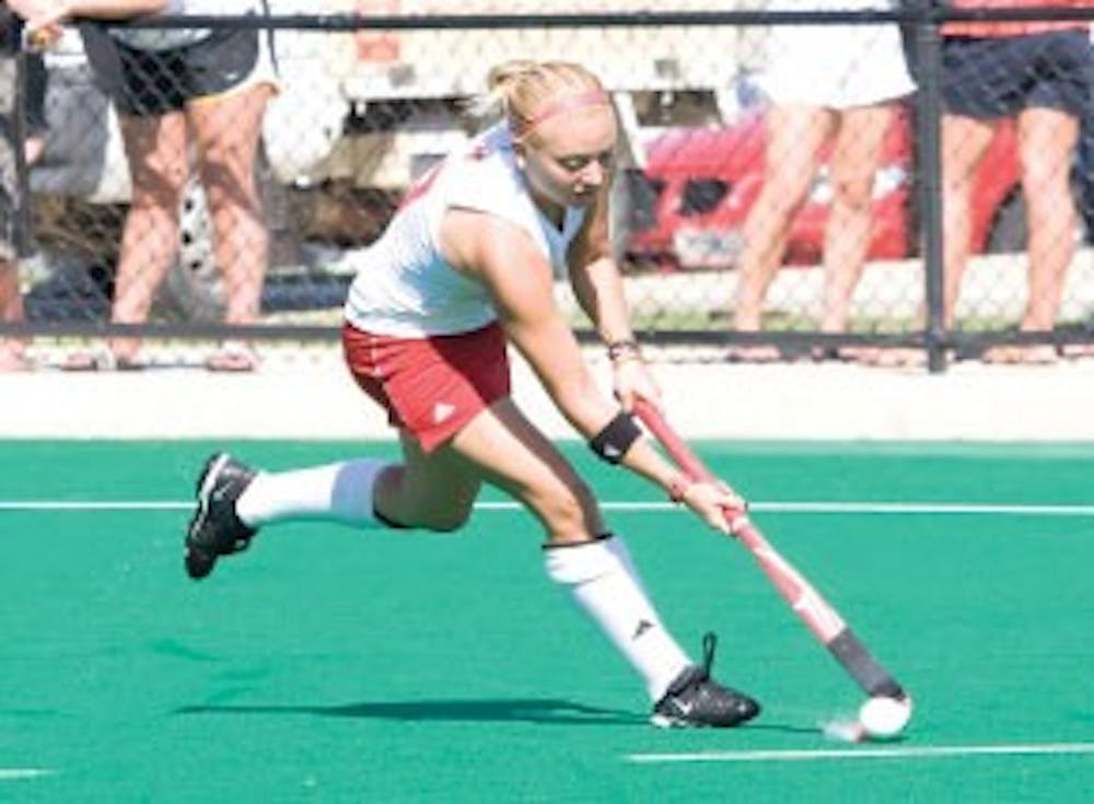 Kate Snyder moves down the turf in a game against CMU Sept. 11, 2009.