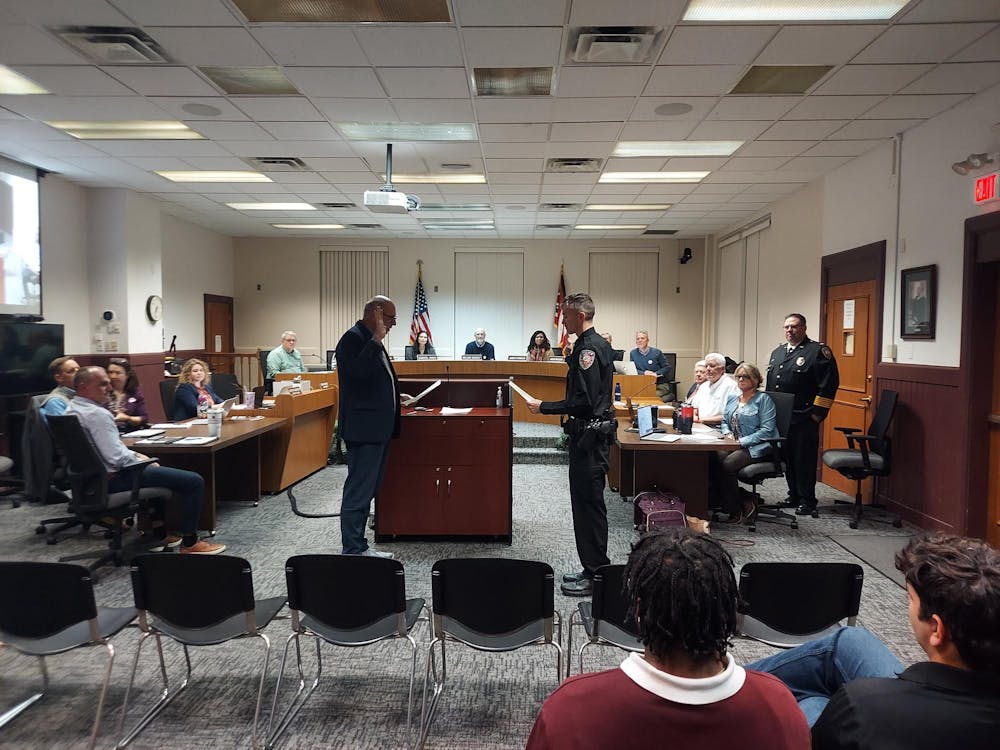 New OPD officer Lincoln Wolf being sworn in.