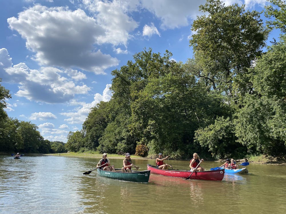 <p>Outdoor pursuits center members kayak on the Little Miami River near Loveland, Ohio.</p>