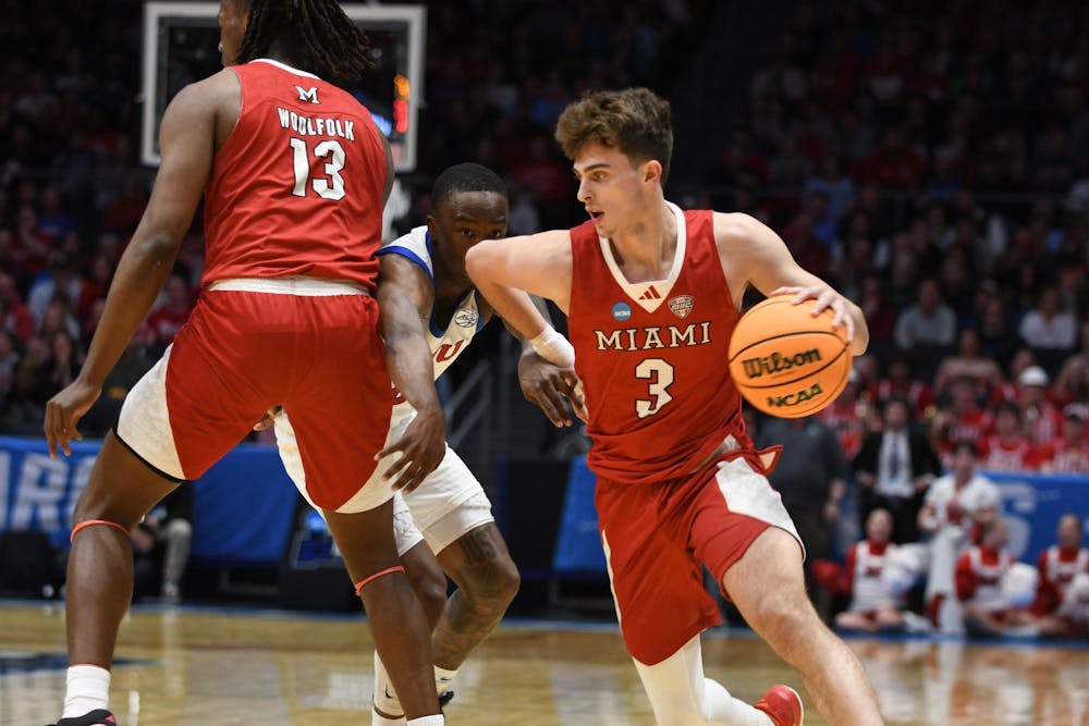 Sophomore guard Luke Skaljac sprints down the court at UD Arena against SMU during the First Four matchup on March 18