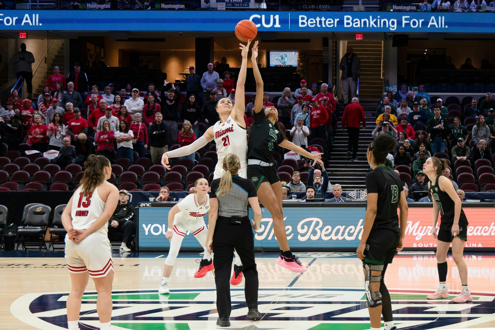 Sophomore forward Ilse de Vries forces the tipoff in Miami's favor to start the semifinal game.