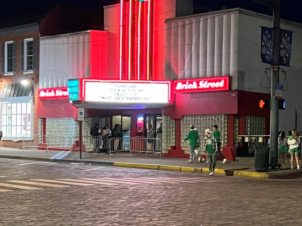 Students fill Brick Street to celebrate Green Beer Day.