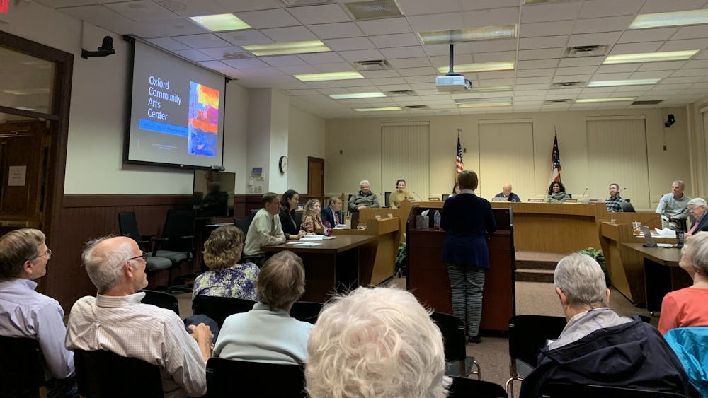 Heidi Schiller, executive director of the Oxford Community Arts Center, delivers a presentation to city council about the center's accomplishments for the fiscal year.