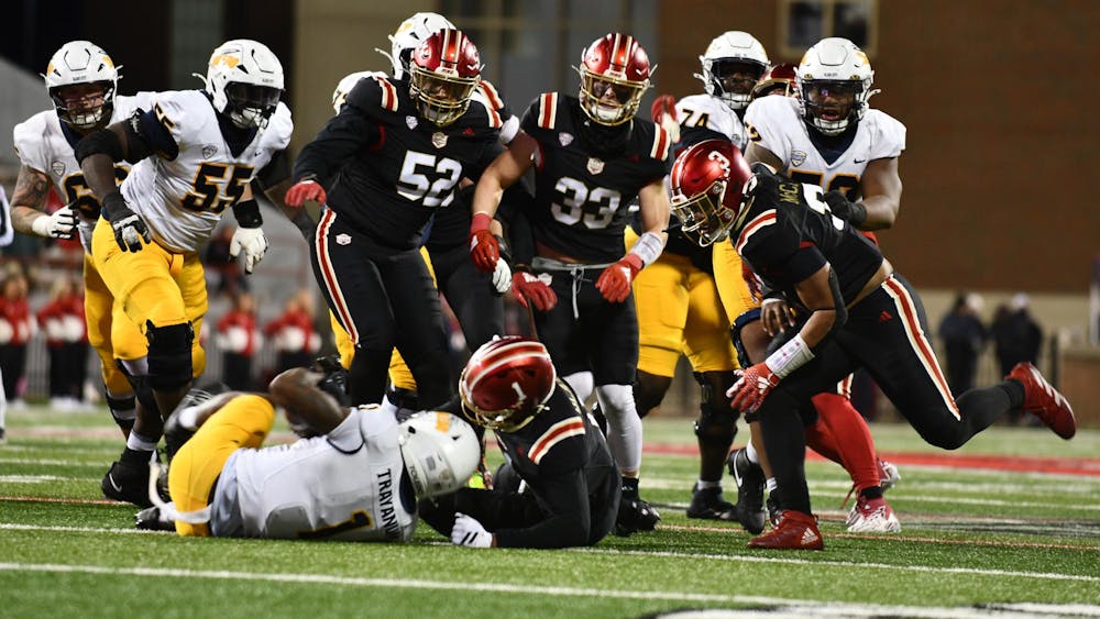 The Miami defense tackles a Toledo player at Yager Stadium on Nov. 12