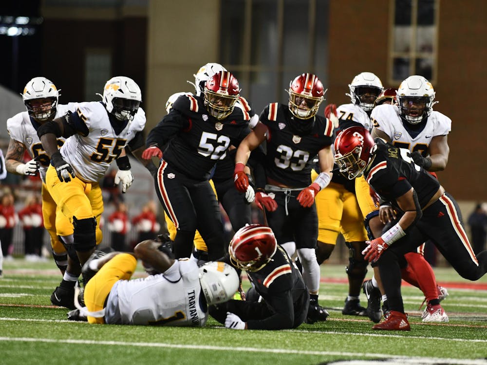 The Miami defense tackles a Toledo player at Yager Stadium on Nov. 12