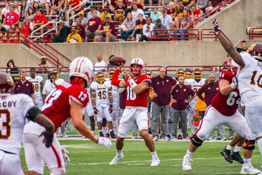 Redshirt sophomore quarterback AJ Mayer looks to throw to sixth-year senior wide receiver Jack Sorenson in Miami's 28-17 over Central Michigan.