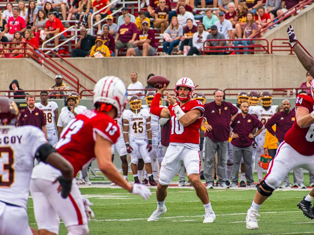 Redshirt sophomore quarterback AJ Mayer looks to throw to sixth-year senior wide receiver Jack Sorenson in Miami's 28-17 over Central Michigan.