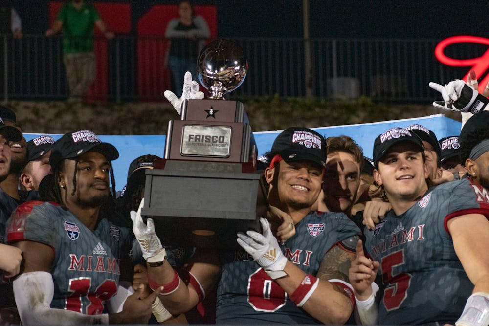 <p>Sophomore Ivan Pace Jr. holds the Frisco Football Classic trophy after Miami&#x27;s 28-17 win over North Texas. Pace Jr. transferred to the University of Cincinnati following the season.</p>
