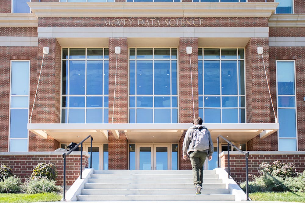 Junior Spencer McCrae walks into McVey Data Science Building, where his advisor’s office is located.
