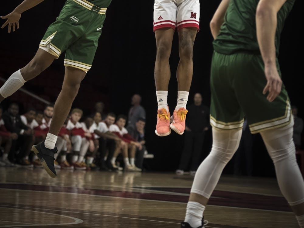 Junior guard Nike Sibande shoots a jumper against Wright State on Nov. 9, 2019, at Millett Hall. Miami lost the game, 88-81, but Sibande scored 24 points.
