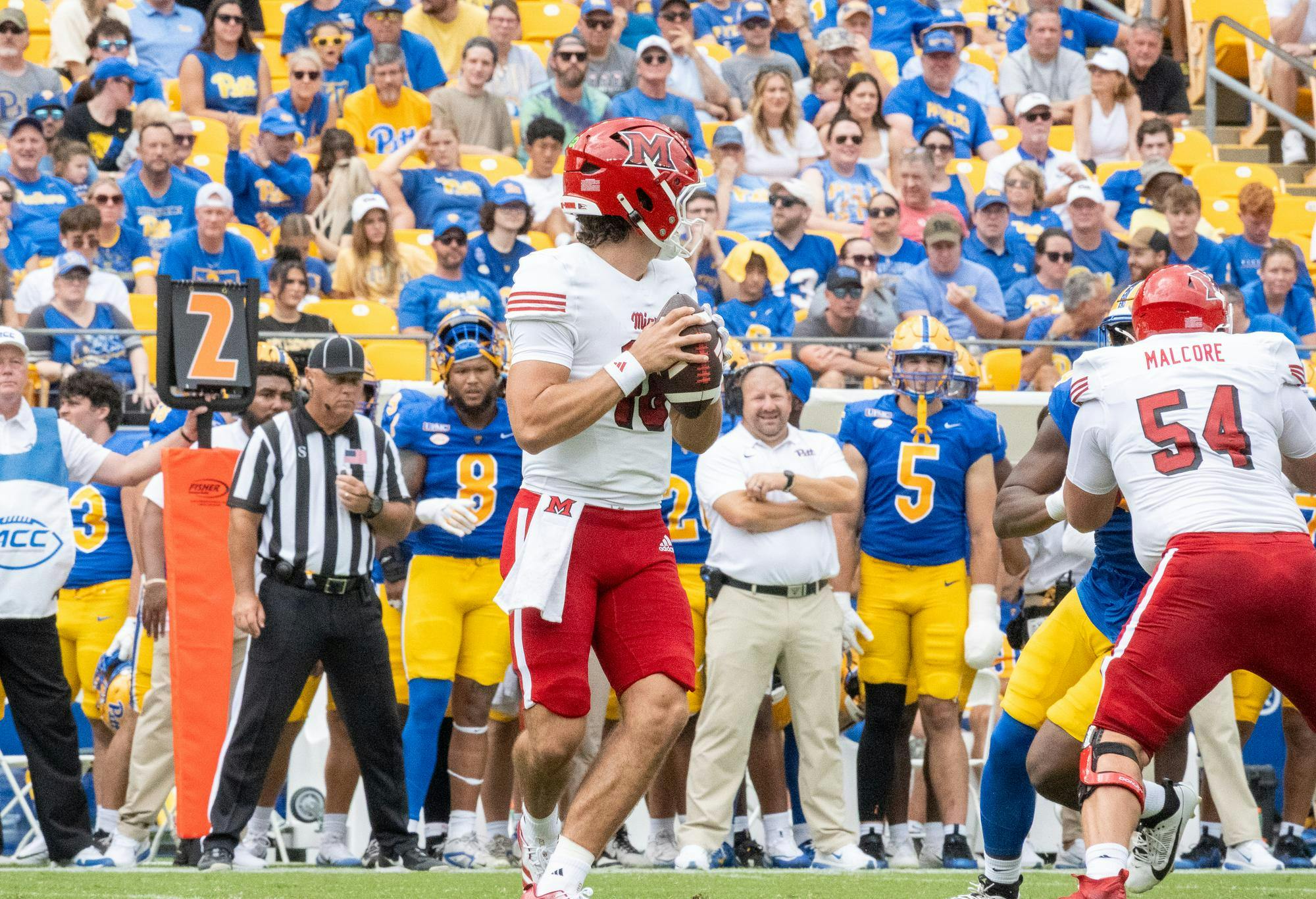 Quarterback David McComb drops back to pass in game against the University of Pittsburgh Panthers on Sept. 5. 