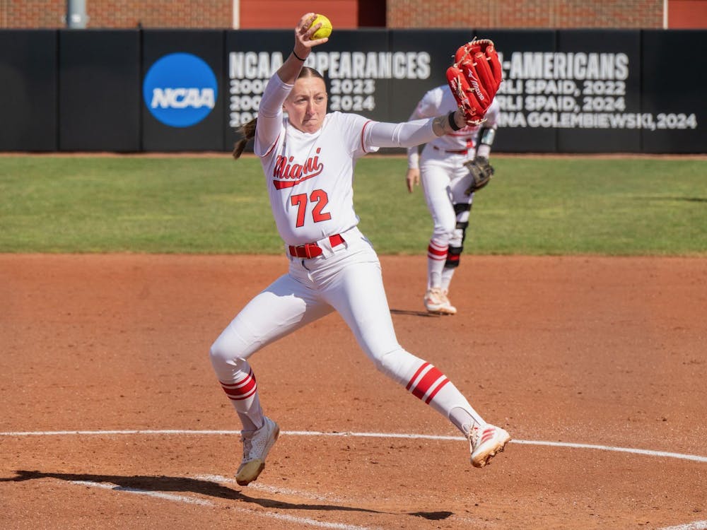 Madilyn Reeves winds up her pitch against the Northern Illinois University Huskies at Miami Softball Stadium on March 21