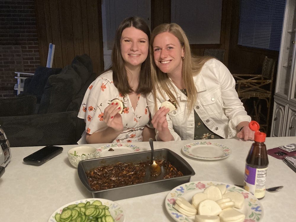 Junior Shea Frawley (left) and junior Anna Szczepaniak (right) enjoy hoisin mushroom buns.