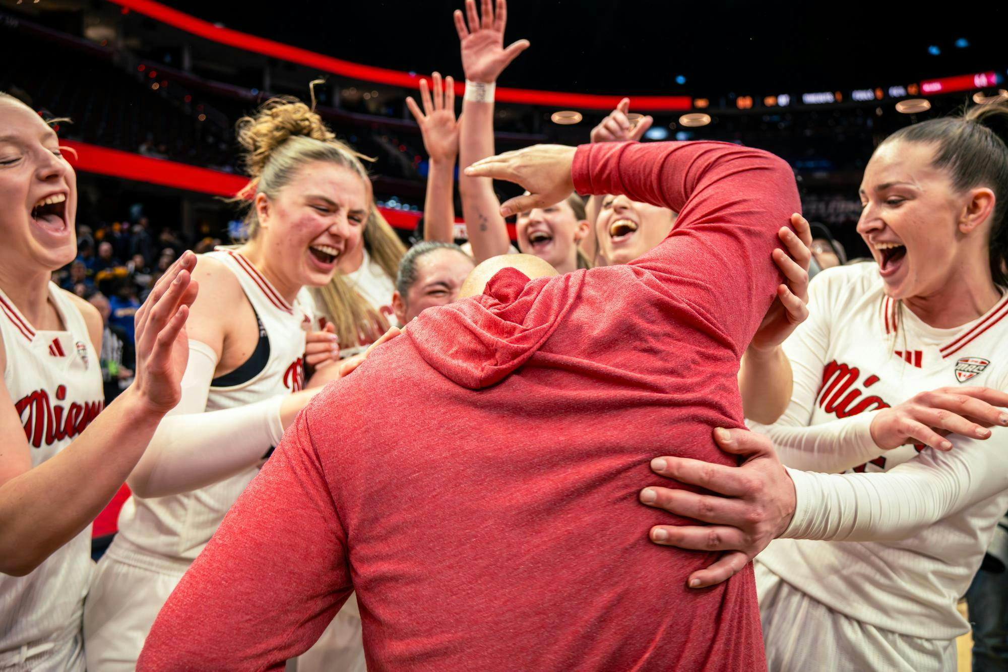 The Miami women's basketball team celebrates at Rocket Mortgage Arena after capturing the MAC championship against Toledo on March 14 in Cleveland